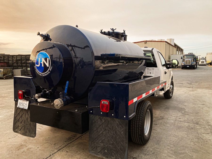 JN Grease vacuum pumping truck staged for service